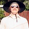 neal, moustache, shades, hat, flying bocce balls, power lines